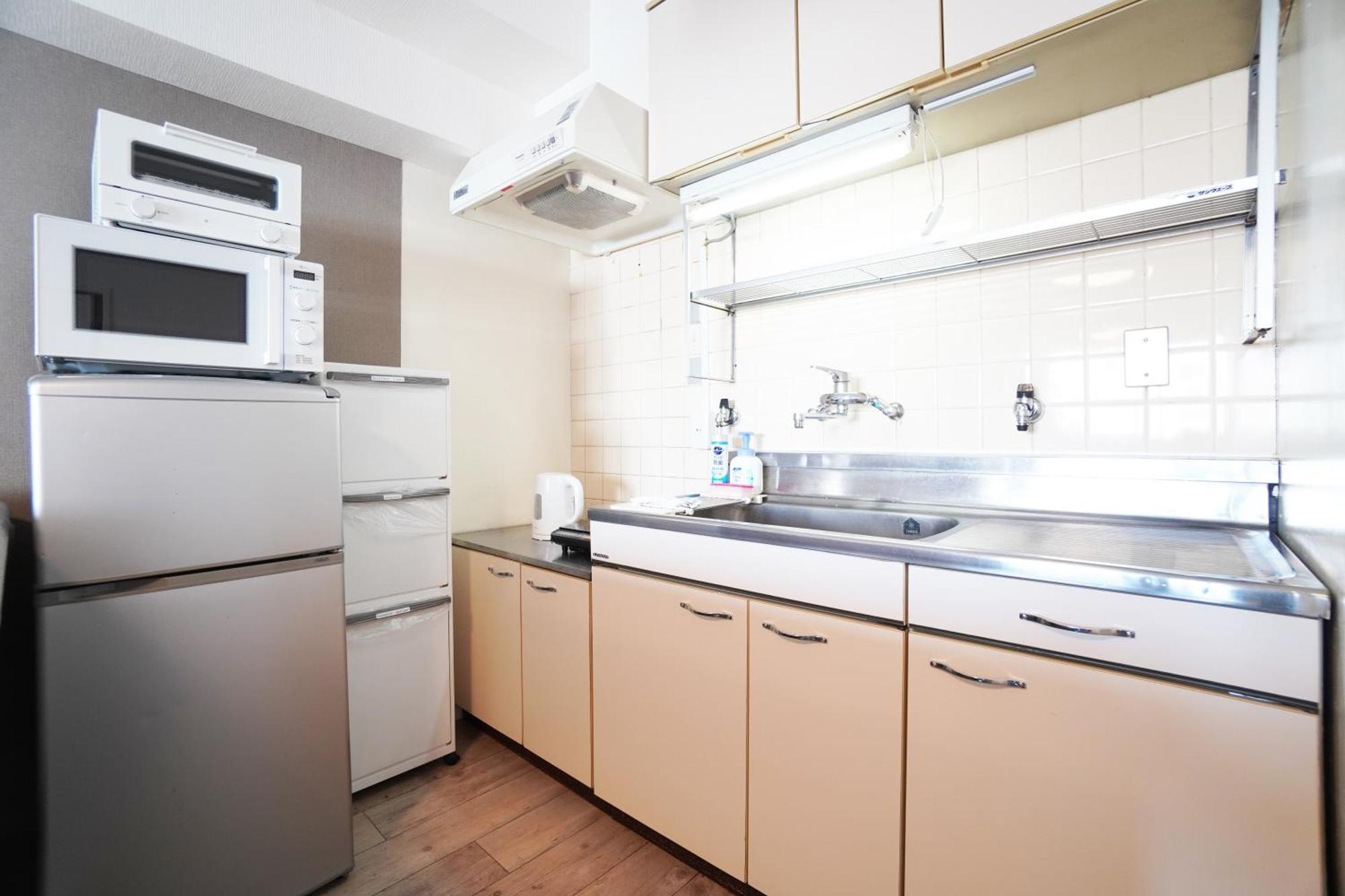 Appartement Tsurigane Building à Ōsaka Extérieur photo